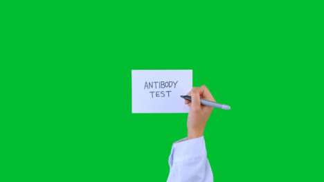 Arzt-Schreibt-Antikörpertest-Auf-Papier-Mit-Grünem-Bildschirm